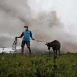 Thousands Flee Erupting Volcano