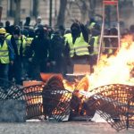 France's 'yellow vests' face off with police