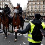 France's 'yellow vests' face off with police