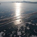 Stunning Photos of Cars Taking Short-cut Across Icy River in Siberia - About Islam