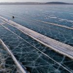 Stunning Photos of Cars Taking Short-cut Across Icy River in Siberia - About Islam