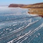 Stunning Photos of Cars Taking Short-cut Across Icy River in Siberia - About Islam