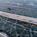 Stunning Photos of Cars Taking Short-cut Across Icy River in Siberia - About Islam