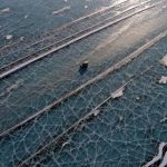 Stunning Photos of Cars Taking Short-cut Across Icy River in Siberia - About Islam