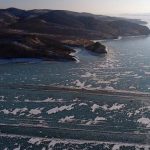 Stunning Photos of Cars Taking Short-cut Across Icy River in Siberia - About Islam