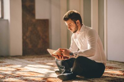 Young adult Muslim reading